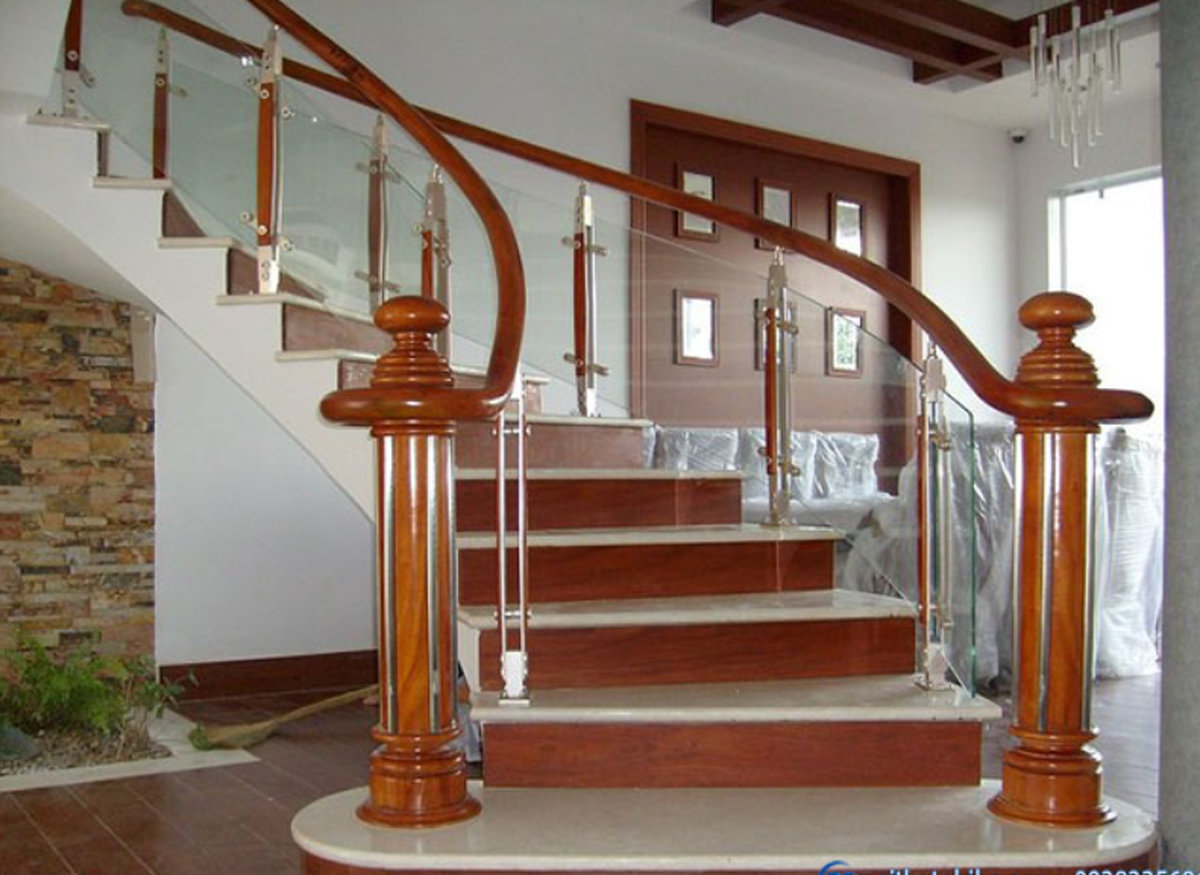 Lan can cầu thang inox tay vịn gỗ tại HCM